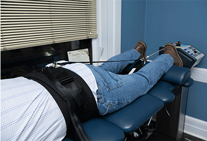Male patient receiving Spinal Decompression therapy in Hoboken, NJ