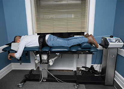 Male patient receiving Spinal Decompression therapy in Hoboken, NJ